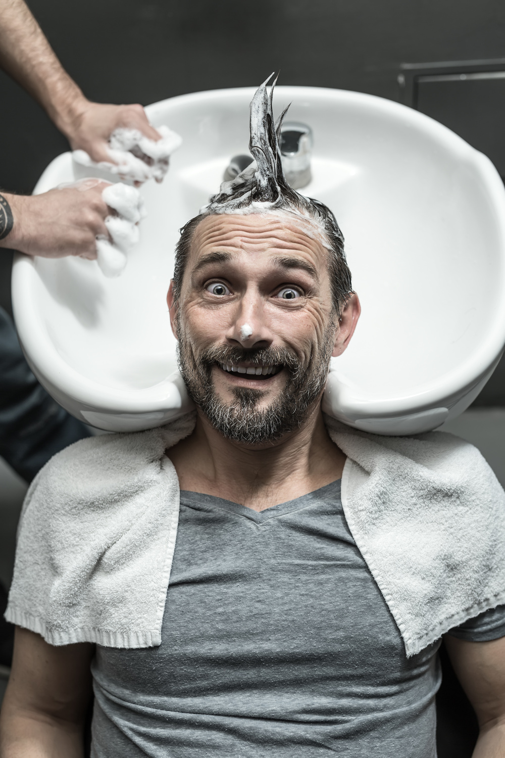 Stylish man in barbershop